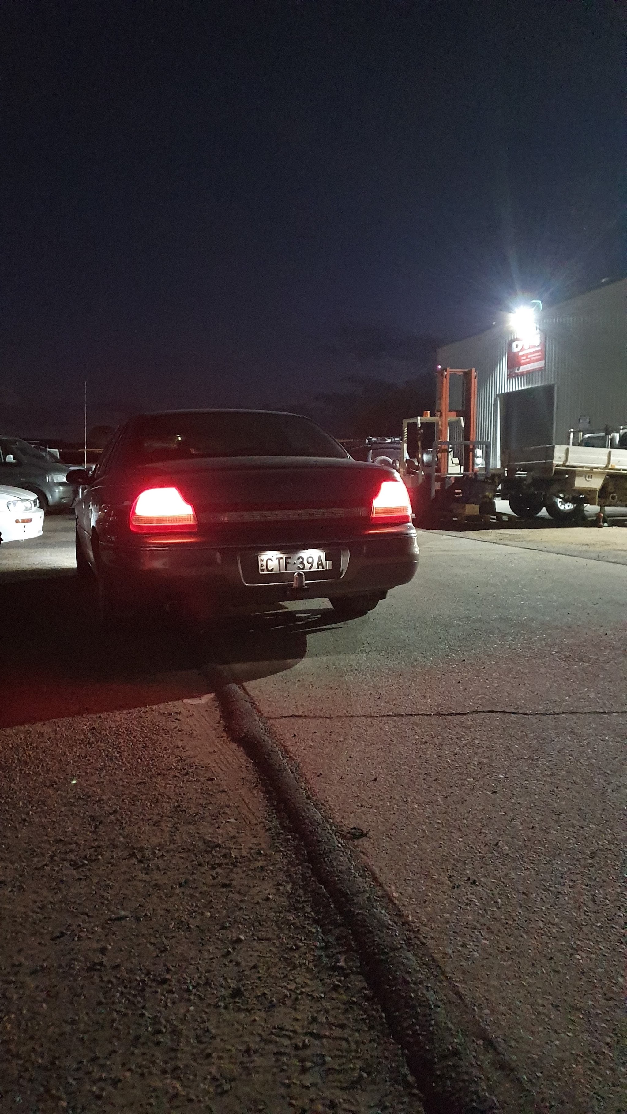 Outside the R/T Automotive workshop in the evening